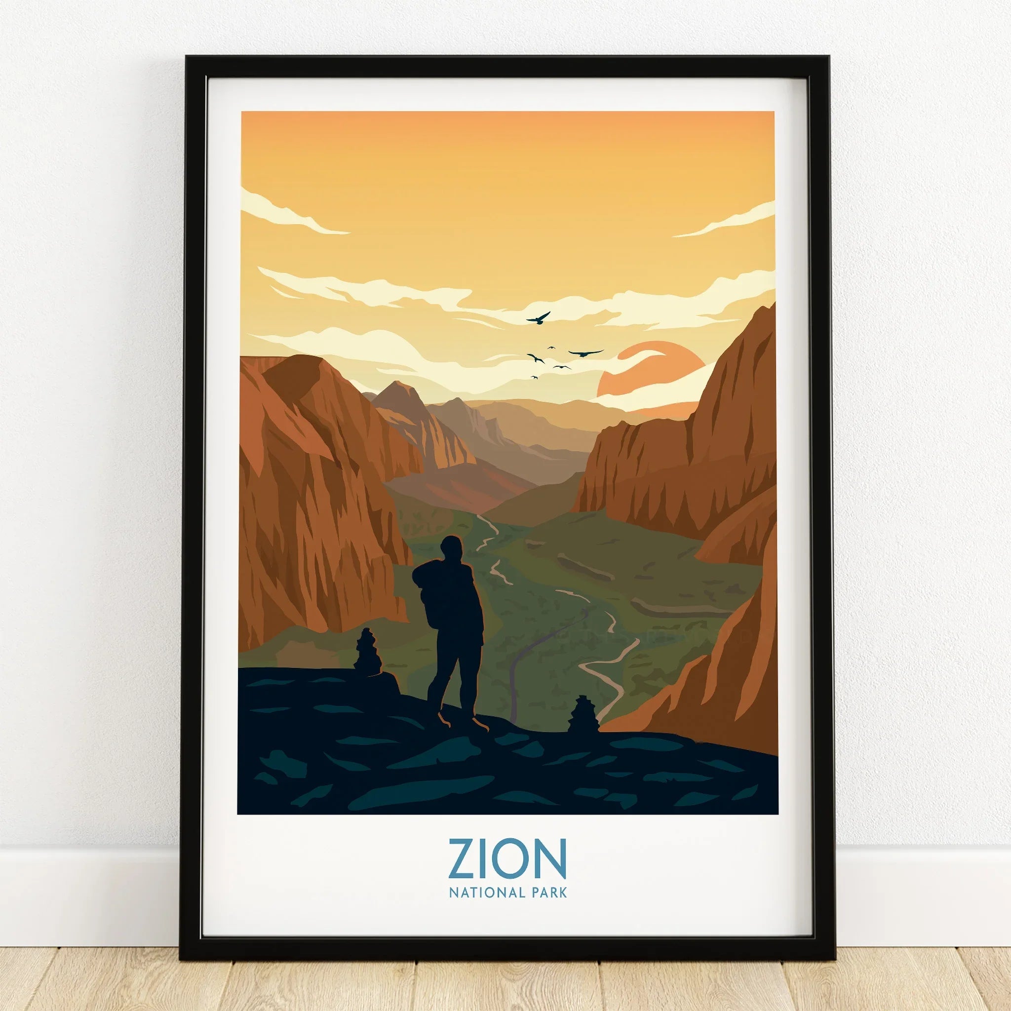 Zion National Park art print with hiker silhouette, scenic canyon, and sunset in black frame
