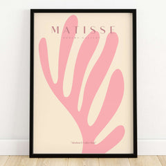 Matisse Art Prints -    Pink Coral Leaf Abstract Botanical Poster showcased in a framed design with soft coral pink leaf shapes.