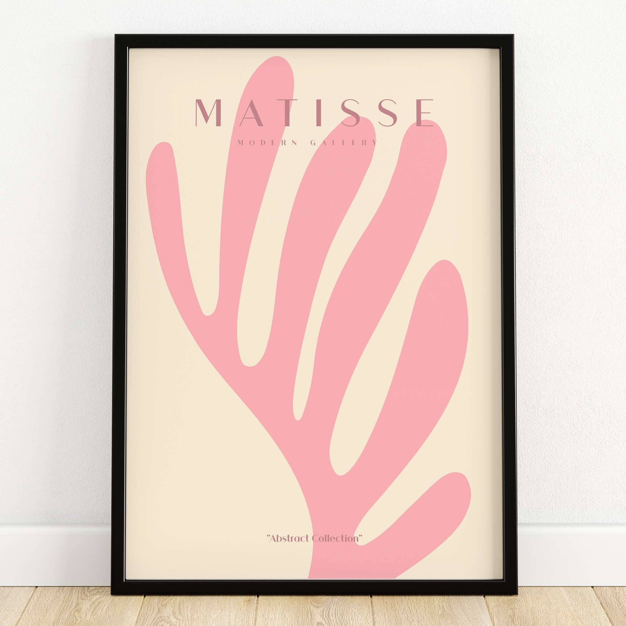 Matisse Art Prints -    Pink Coral Leaf Abstract Botanical Poster showcased in a framed design with soft coral pink leaf shapes.