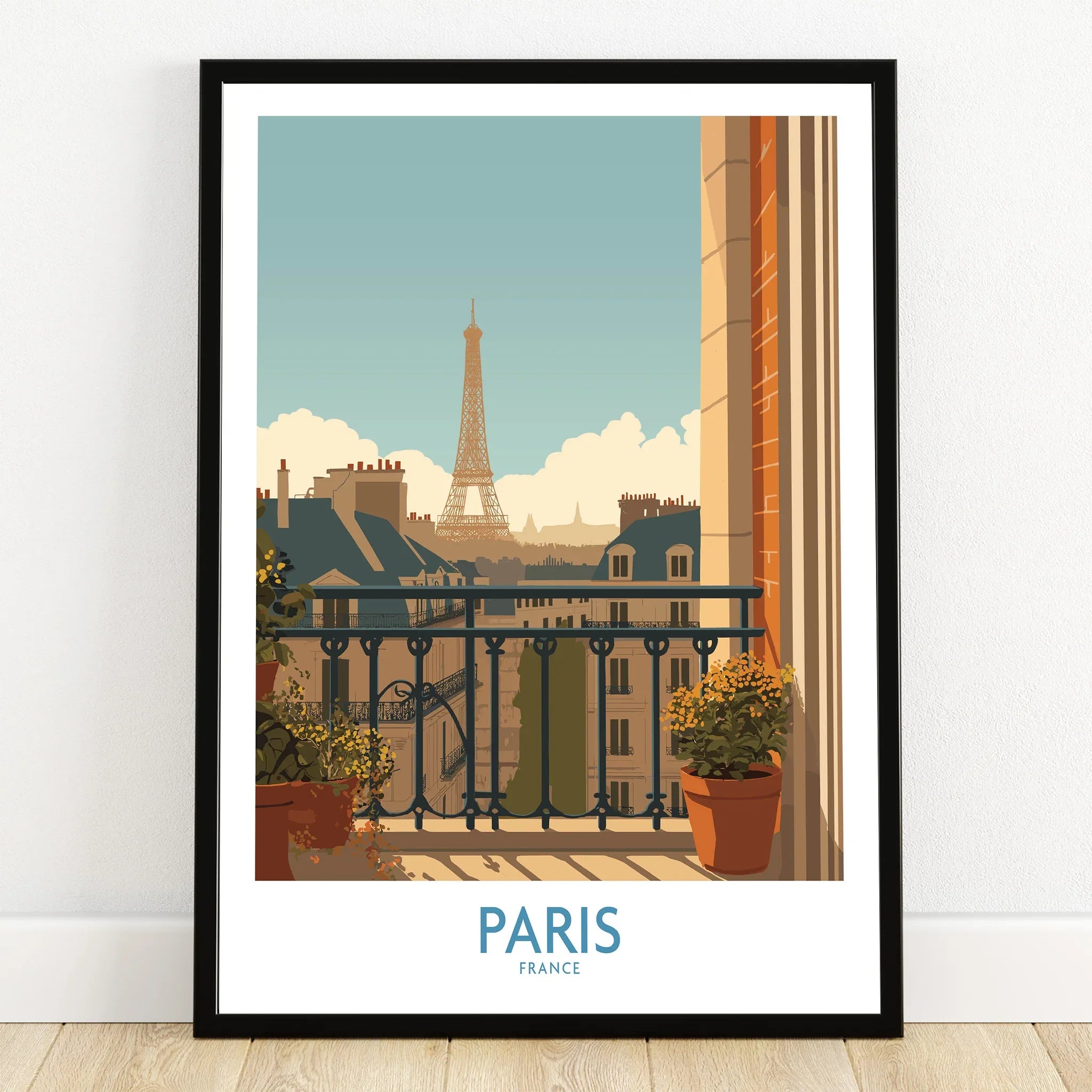 Paris art print in black frame showing Eiffel Tower view from balcony with potted plants