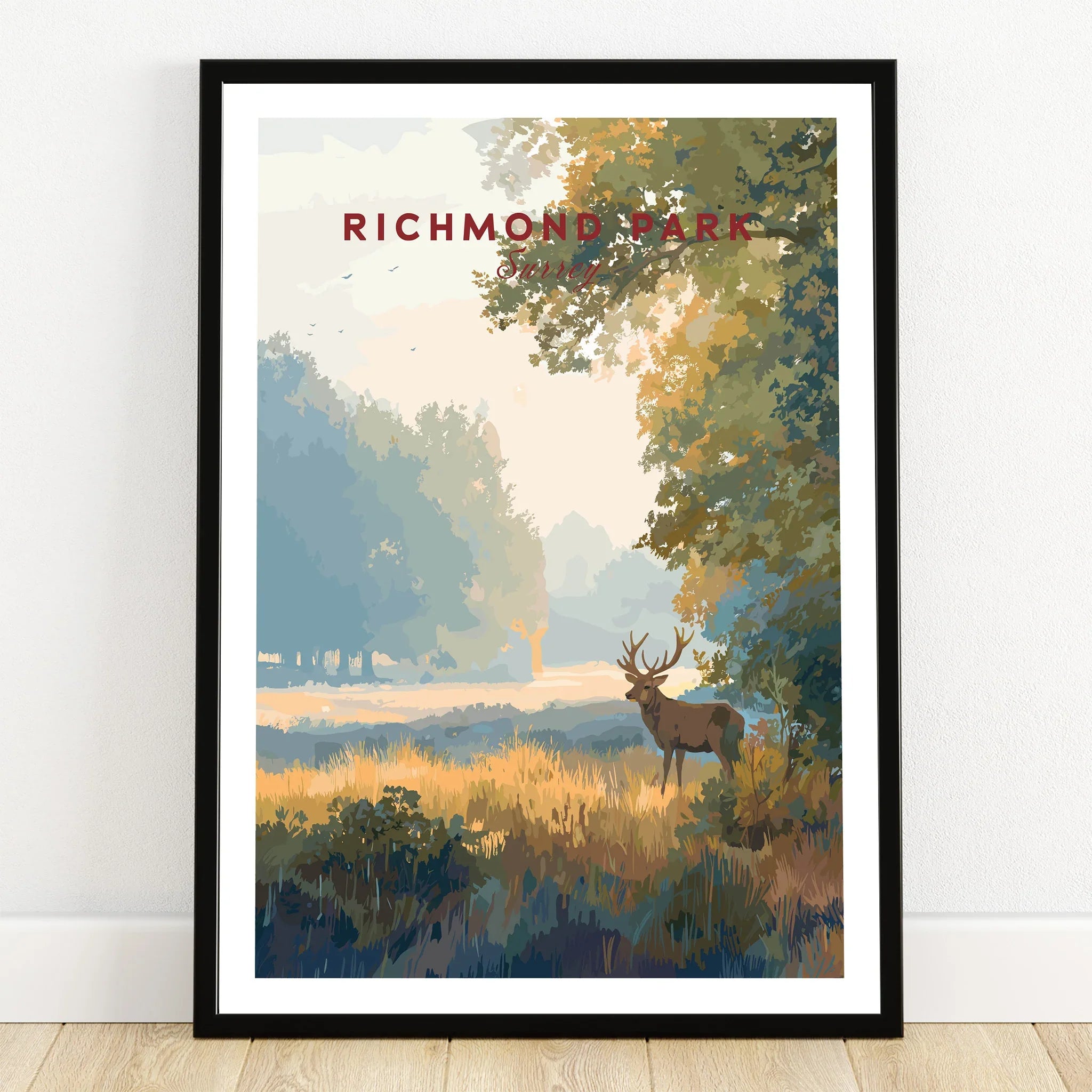Richmond Park art print in black frame, featuring a stag in a scenic woodland landscape