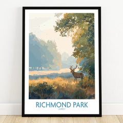 Richmond Park art print in black frame, featuring a stag in a scenic landscape, on wooden floor