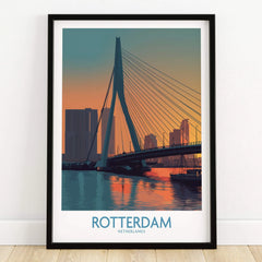 Rotterdam travel poster art print in black frame, city skyline and bridge at sunset on wooden floor