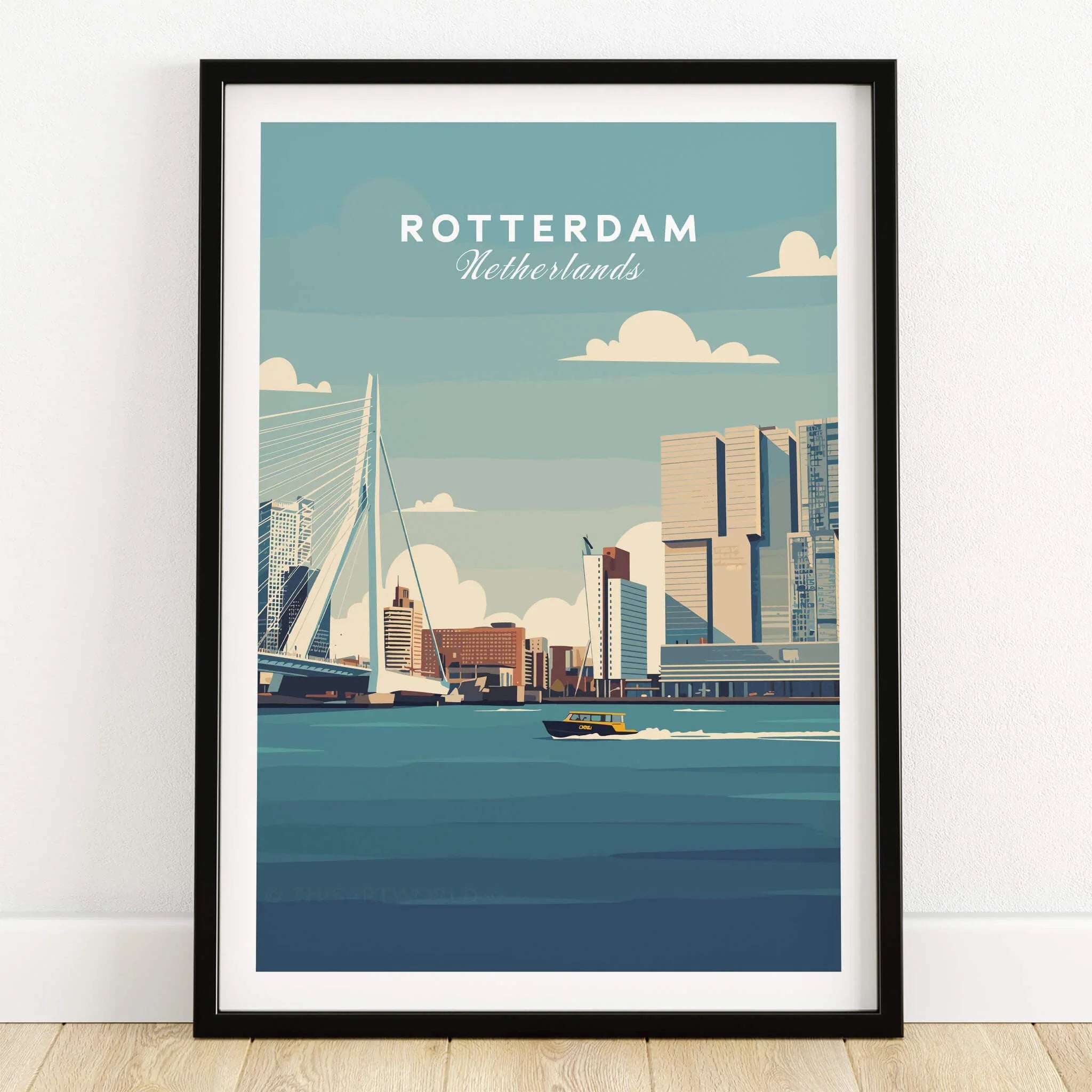 Rotterdam city skyline travel poster in black frame on wooden floor.