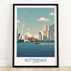 Rotterdam Netherlands travel poster art print in black frame on wooden floor, featuring city skyline and river