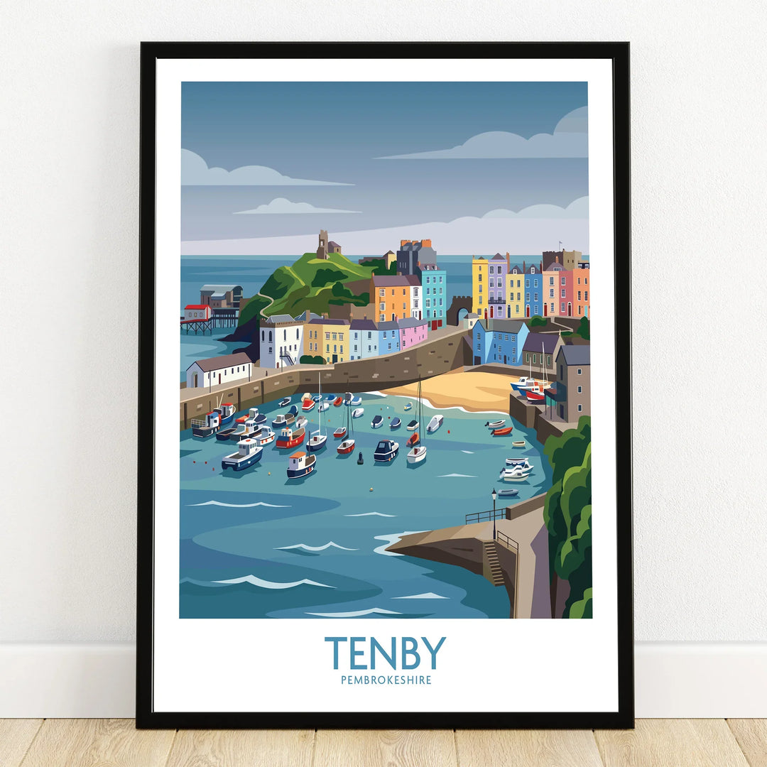 Tenby travel art print in black frame, colorful harbor scene with boats and pastel houses