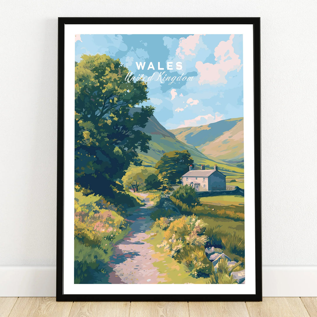 Wales travel art print in black frame featuring countryside cottage and mountains