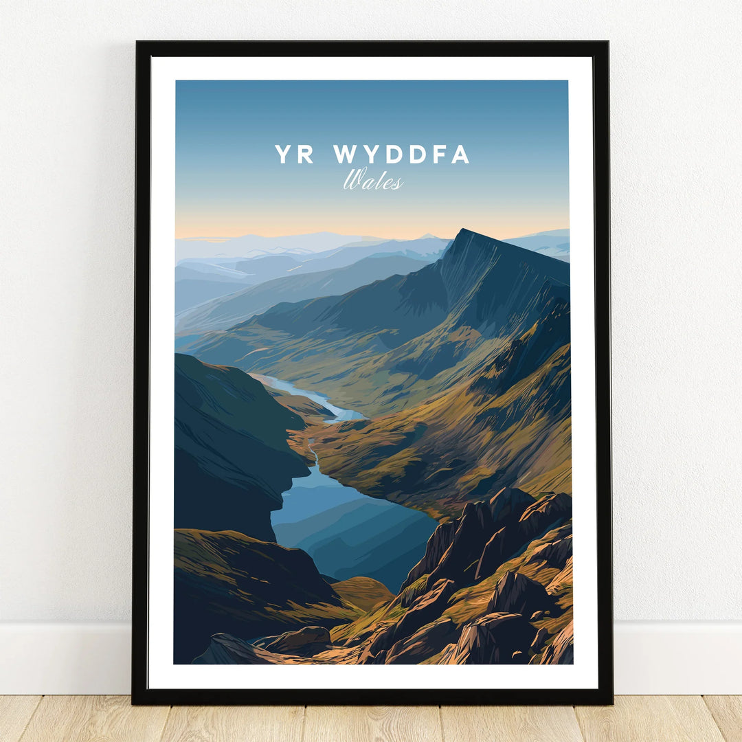Yr Wyddfa Wales travel poster print in black frame on wooden floor.