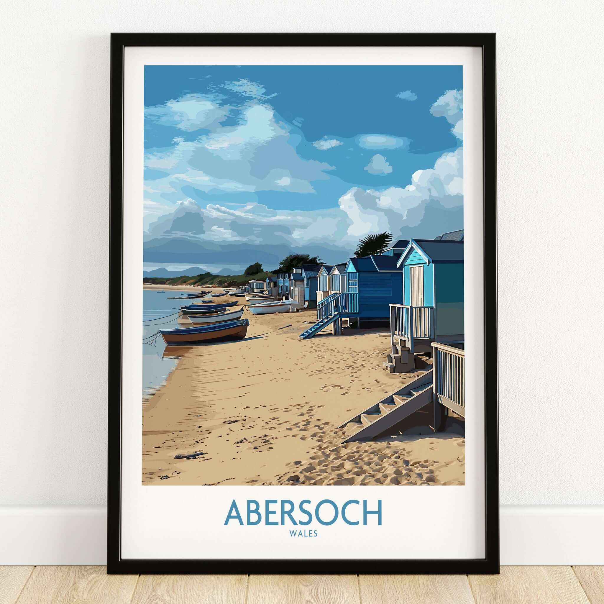 Abersoch Wales Beach Huts Art Print | Coastal Boats Wall Decor Poster featuring beach huts and boats on sandy shore.