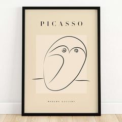Picasso Abstract Owl Line Art Minimalist Bird Poster Modern Gallery Wall Art in a modern frame on a beige background.