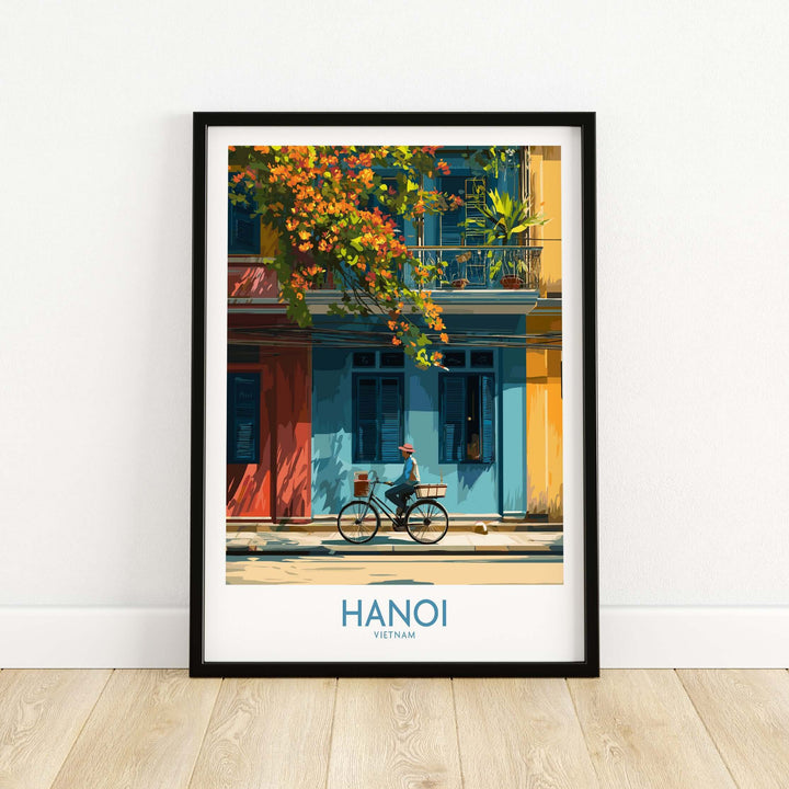 Hanoi wall art poster featuring a cyclist in front of colorful buildings, capturing the essence of Vietnam's capital.