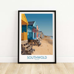 Southwold England Travel Poster featuring colorful beach huts along the coast, showcasing British seaside charm.