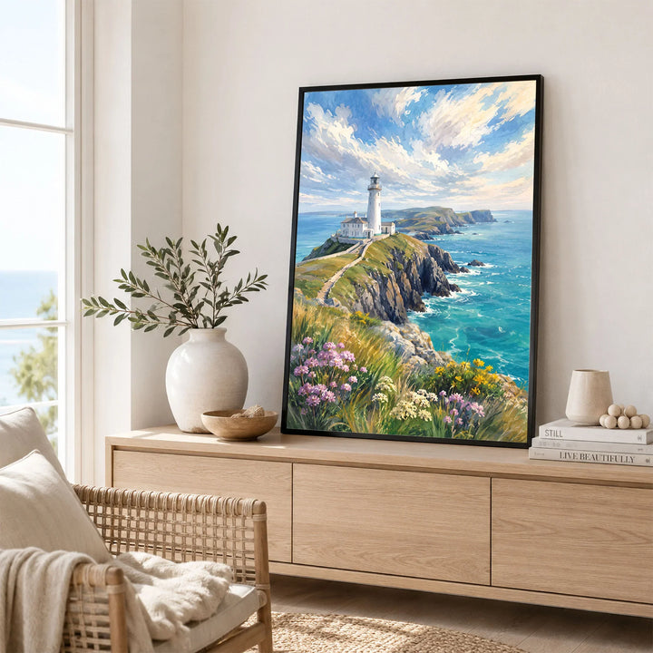 Anglesey clifftop lighthouse watercolour art print framed in a living room