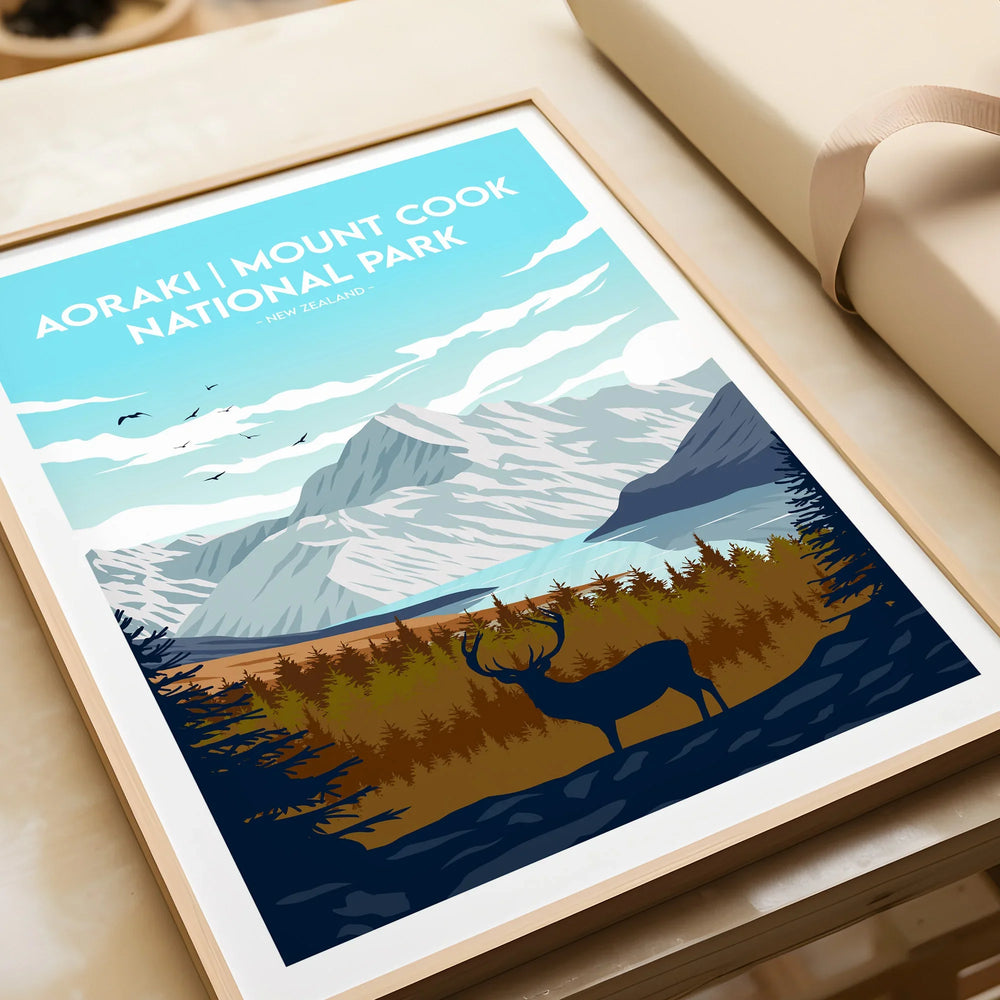 Framed Aoraki Mount Cook National Park art print with mountains, forest, and deer illustration