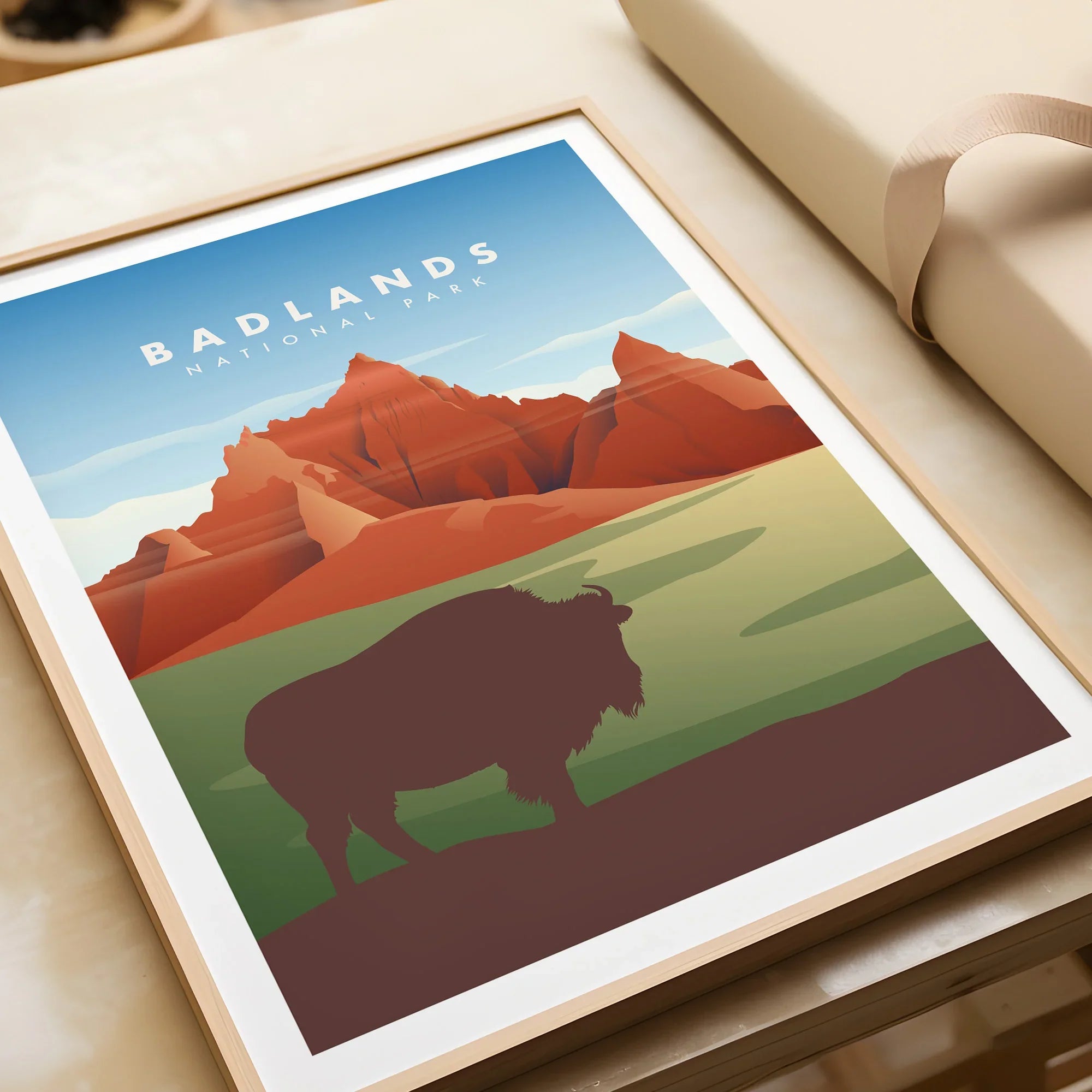 Framed Badlands National Park art print featuring bison silhouette and colorful landscape