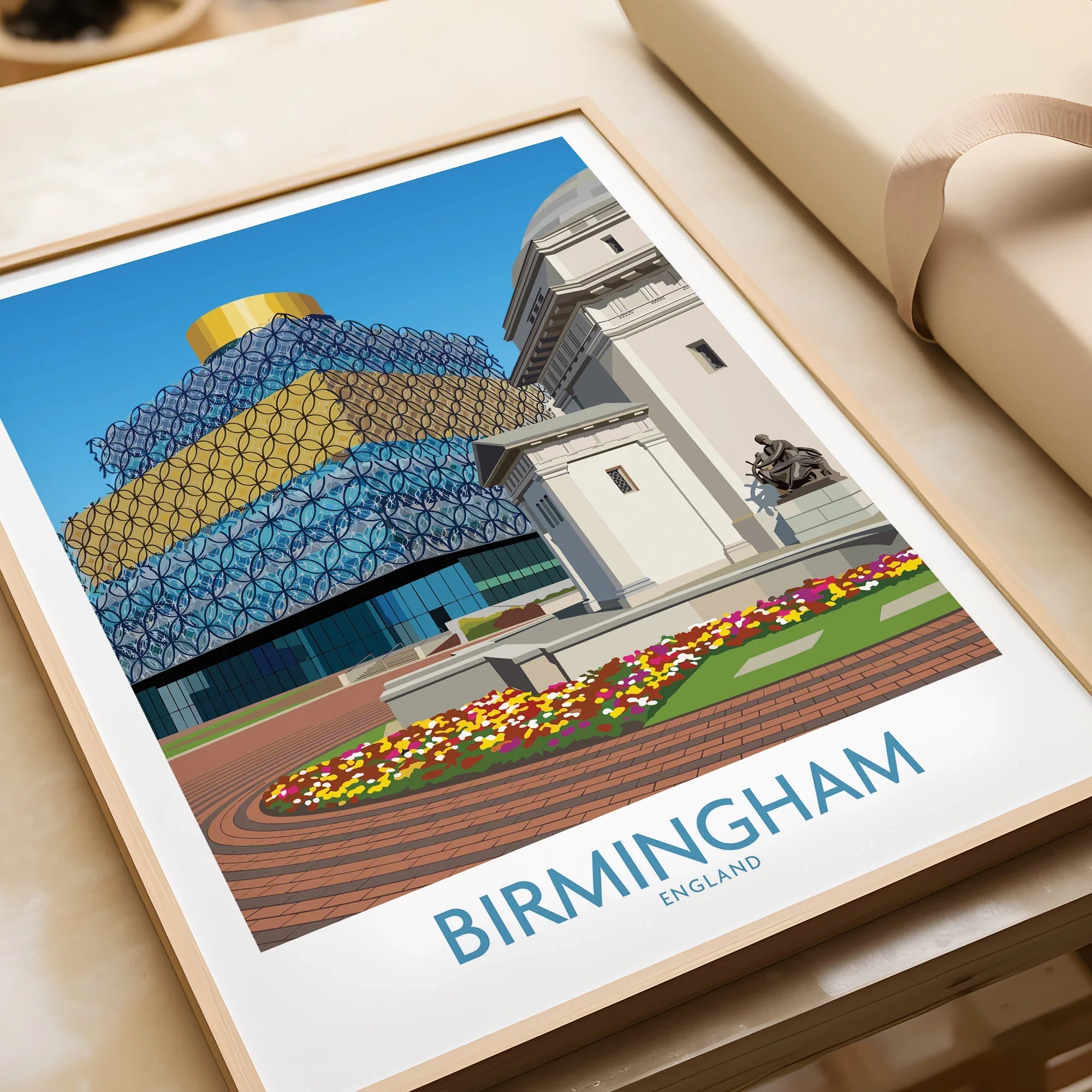 Framed Birmingham travel art print with city architecture and colorful flowers, unwrapped gift