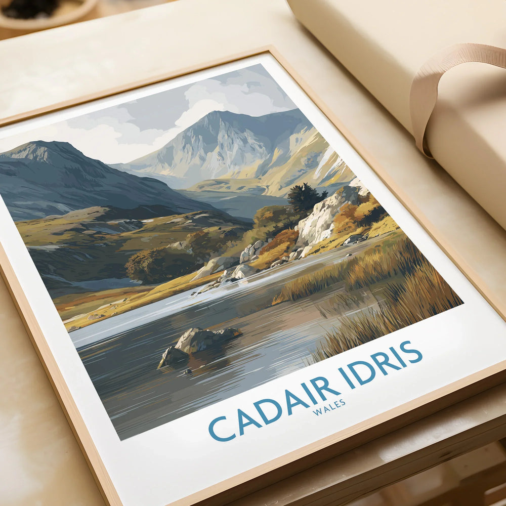 Framed art print of Cadair Idris Wales mountain landscape, closeup on unwrapped gift.