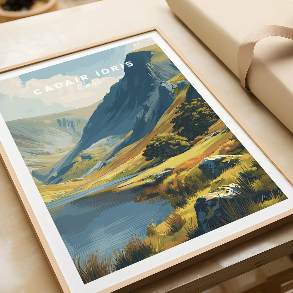 Framed art print of Cadair Idris mountain landscape in Wales, unwrapped on table