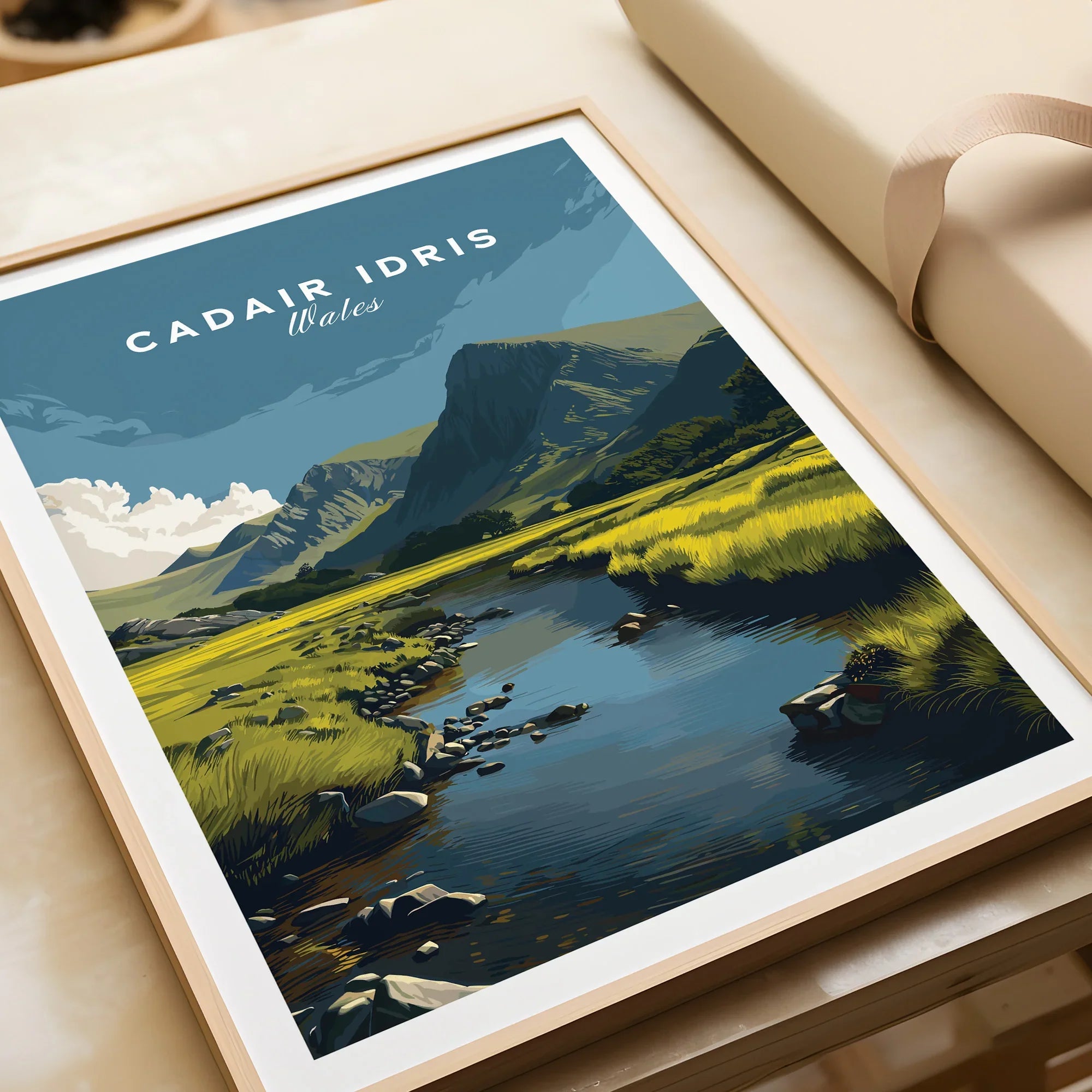 Framed art print of Cadair Idris landscape, river, mountain, and grassy meadow illustration.