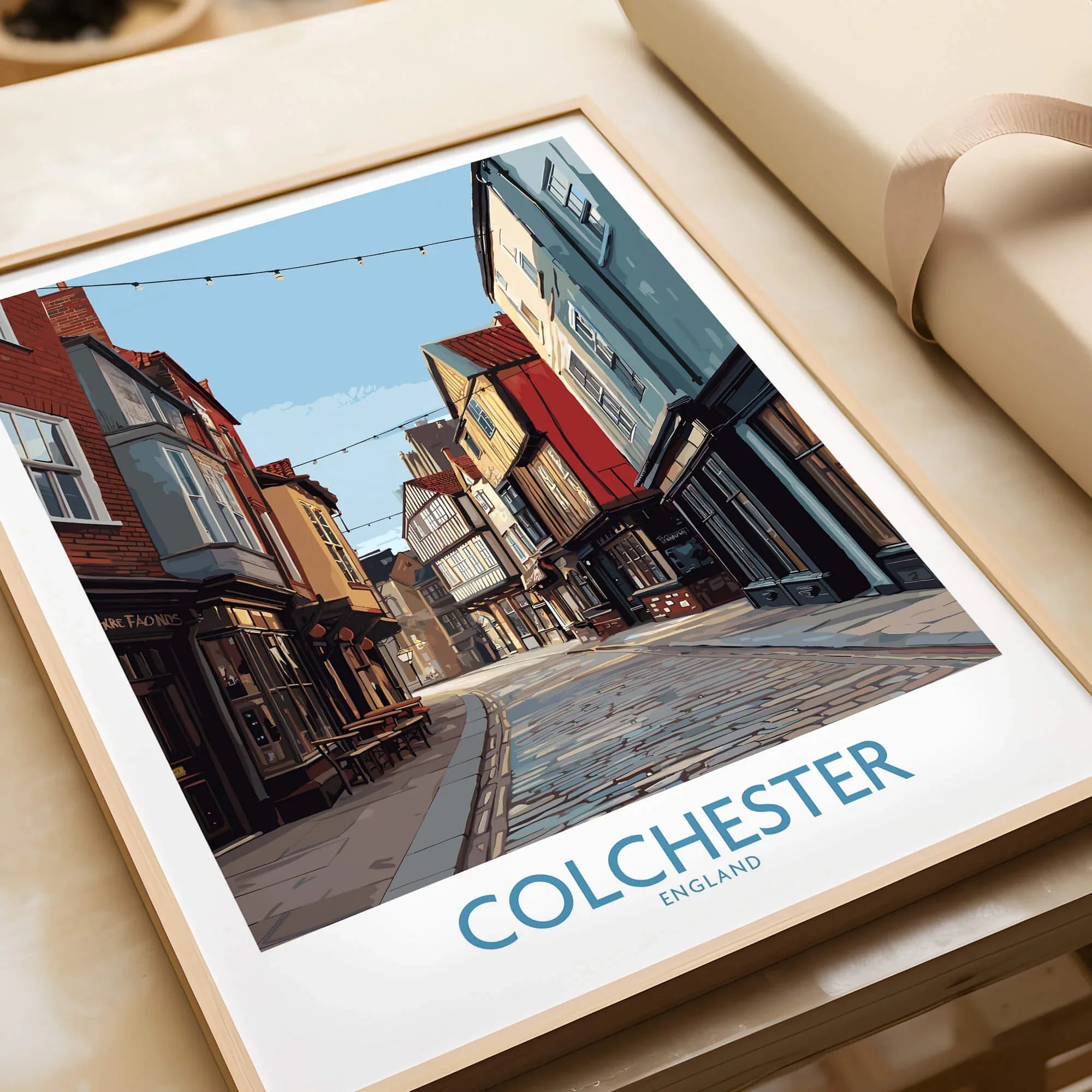 Colchester framed art print with illustrated historic street, wrapped gift, city wall decor