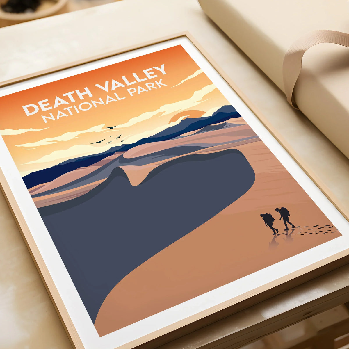 Framed Death Valley National Park art print with hikers and desert landscape closeup