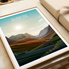 Framed Glencoe National Park art print close-up, showing mountains, sunrise, and deer.