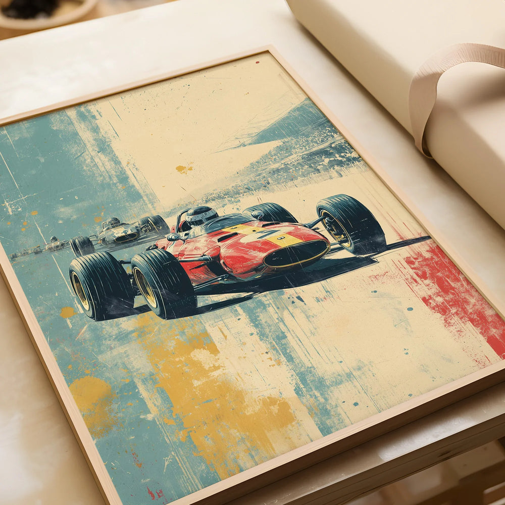 Framed art print of a vintage Formula 1 race car in bold red, closeup on unwrapped gift