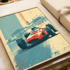 Framed vintage race car art print unwrapped, featuring a red grand prix car on a racetrack