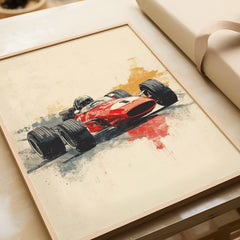 Framed art print of vintage red Formula 1 race car, gift unwrapped, natural wood frame