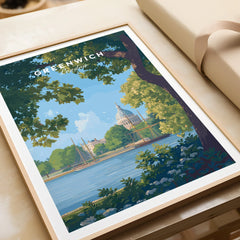 Greenwich London art print in natural wood frame, showing river, trees, and city skyline.