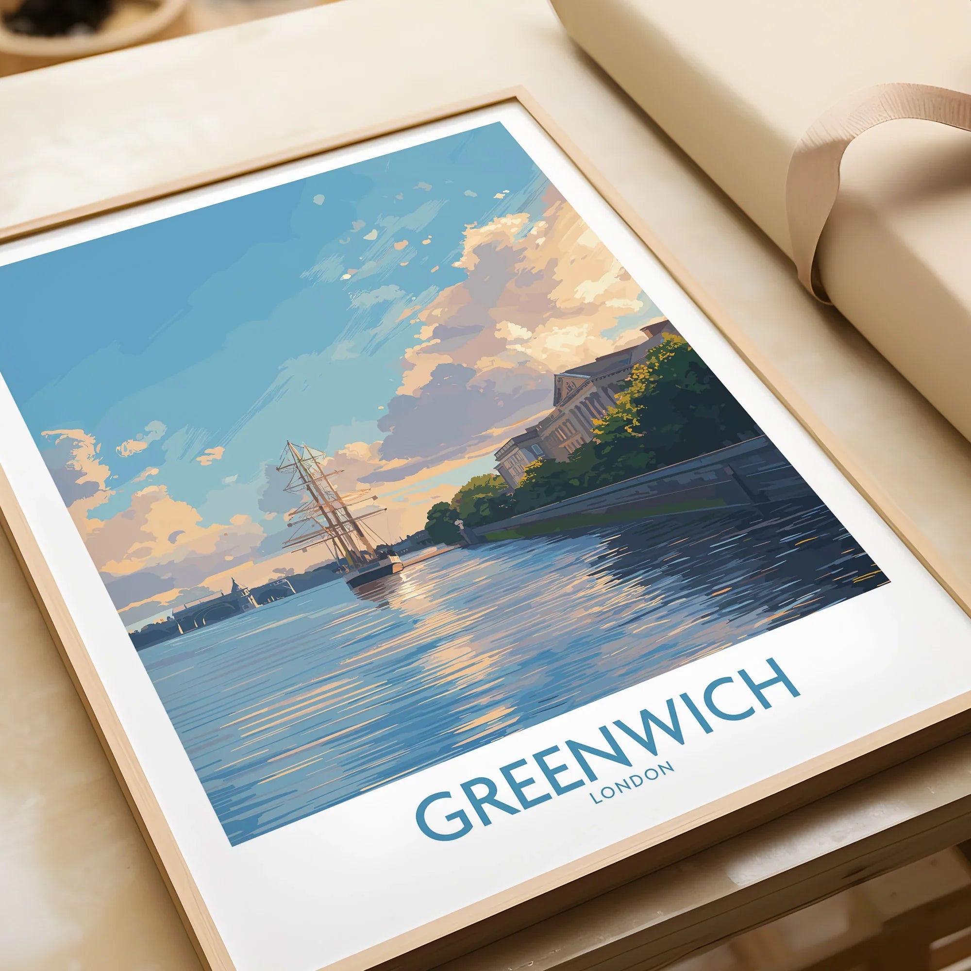 Framed Greenwich London art print with a sunset riverside scene and historic ship, unwrapped.
