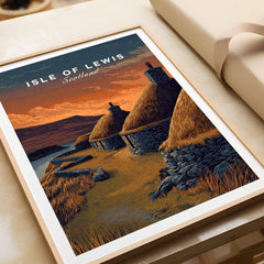 Isle of Lewis Scotland Travel Poster | Blackhouse Village Wall Art Print framed on a table showcasing traditional Scottish architecture.