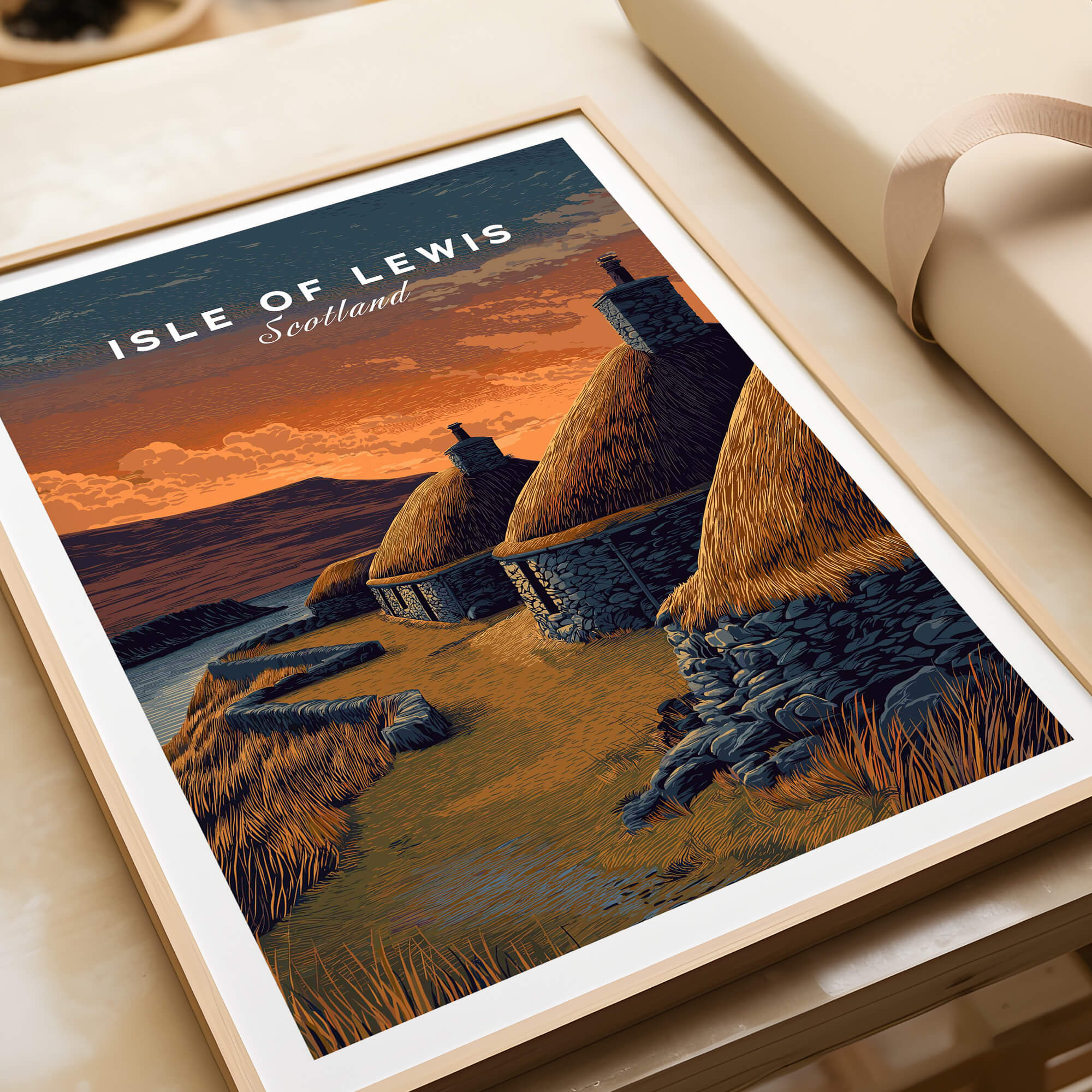 Isle of Lewis Scotland Travel Poster | Blackhouse Village Wall Art Print framed on a table showcasing traditional Scottish architecture.
