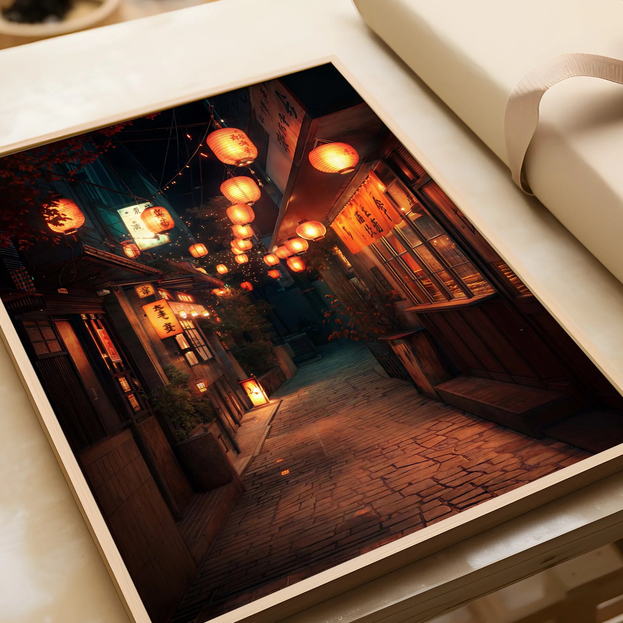 Framed art print of a Japanese street at night with glowing lanterns and shop signs.