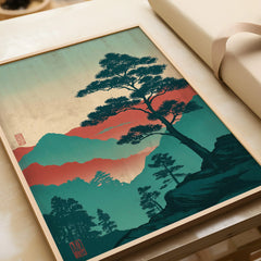 Framed Japanese woodblock art print featuring a pine tree and colorful mountain landscape