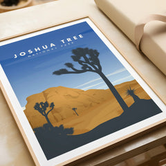Framed Joshua Tree National Park art print with desert landscape and blue sky, unwrapped gift.