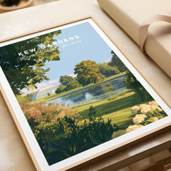 Framed Kew Gardens travel art print showing scenic botanical garden landscape by a pond.