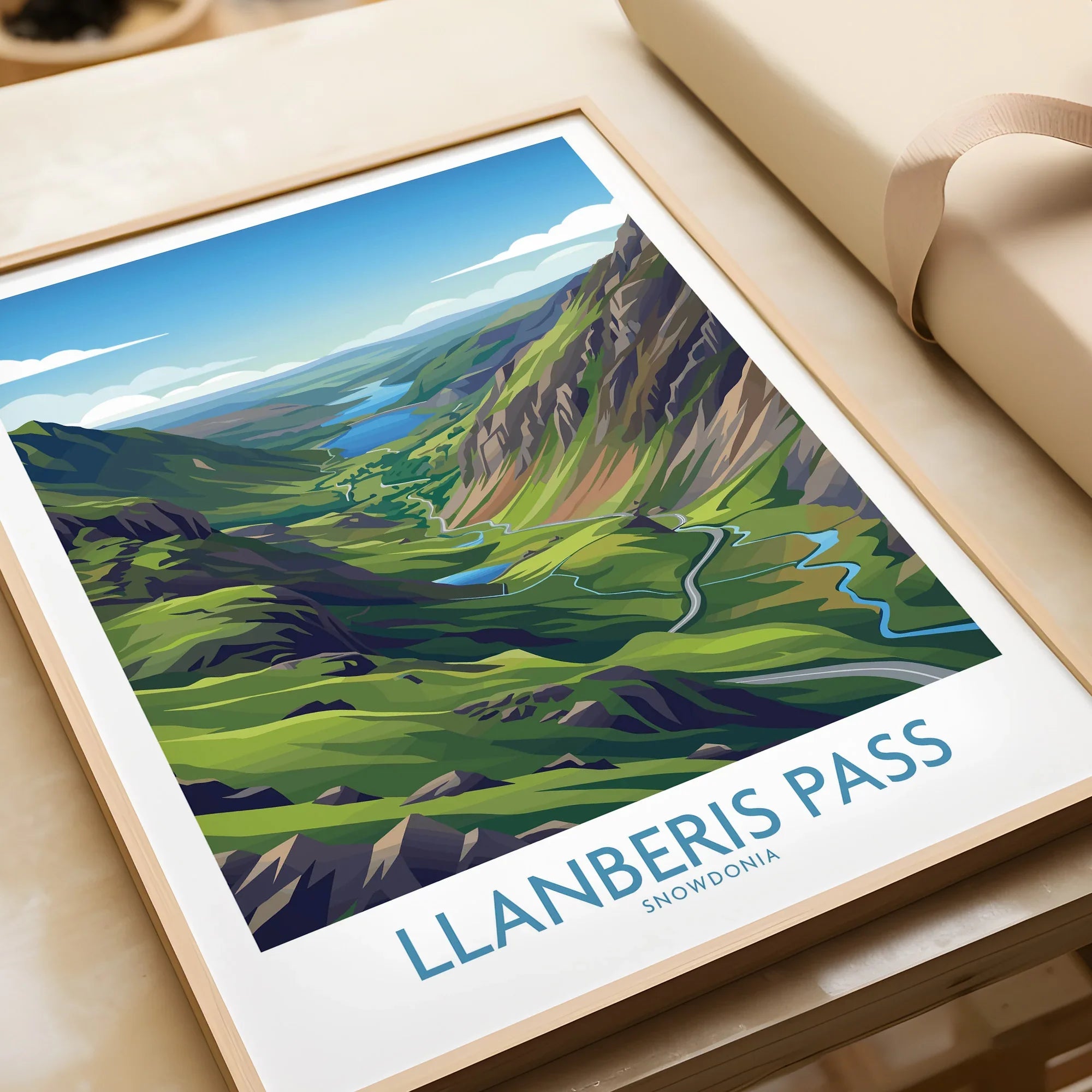 Framed Llanberis Pass Snowdonia art print showing colorful valley landscape and winding road.
