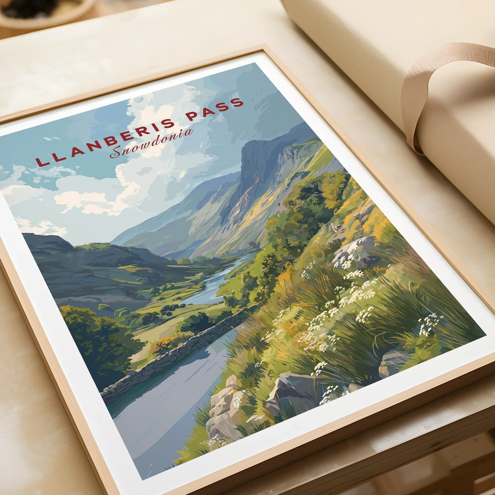 Framed Llanberis Pass Snowdonia art print with scenic mountain landscape and wildflowers.
