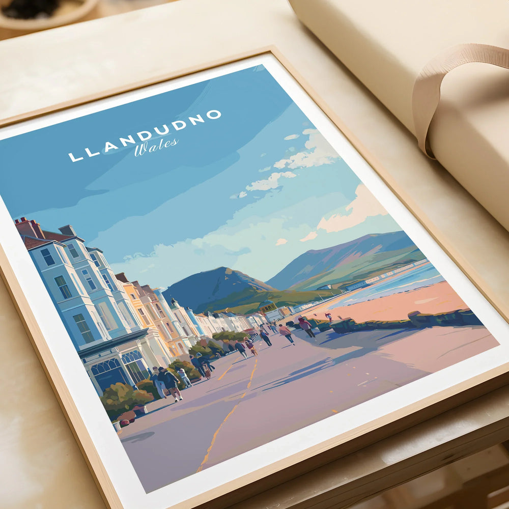 Framed Llandudno Wales travel art print featuring a seaside promenade and mountains.