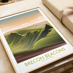 Framed Brecon Beacons National Park art print with green landscape and sunset sky