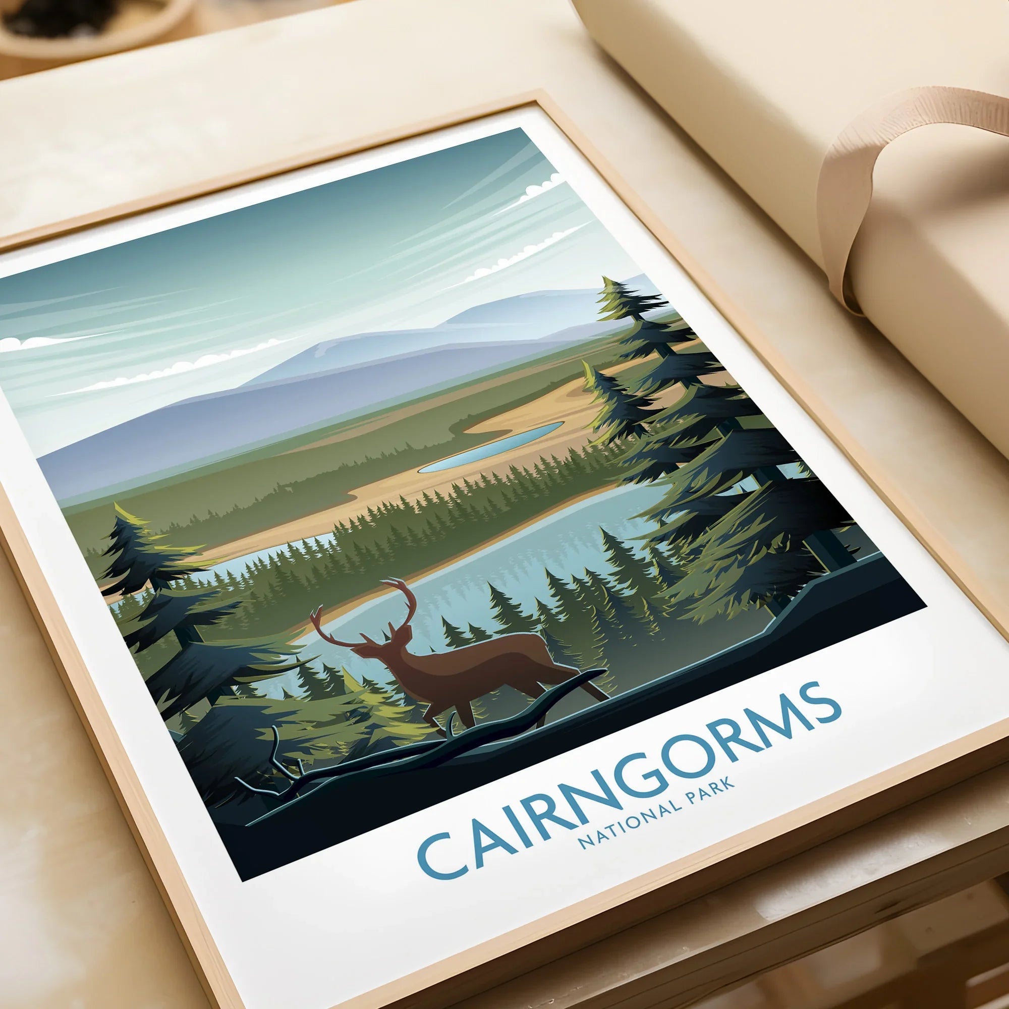 Framed Cairngorms National Park art print featuring a stag, pine trees, and scenic landscape.