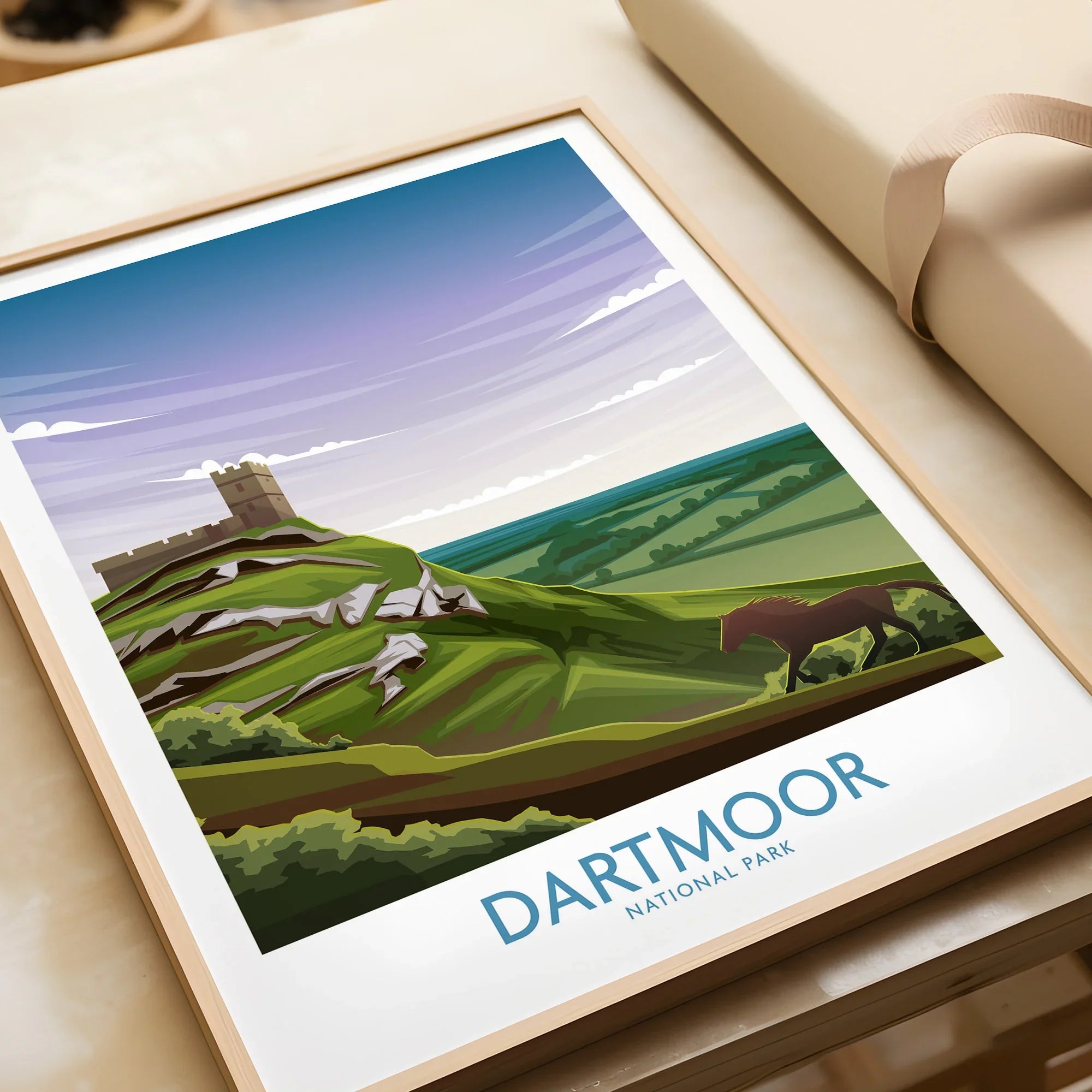 Framed Dartmoor National Park travel poster art print featuring hills, rocks, and horse.