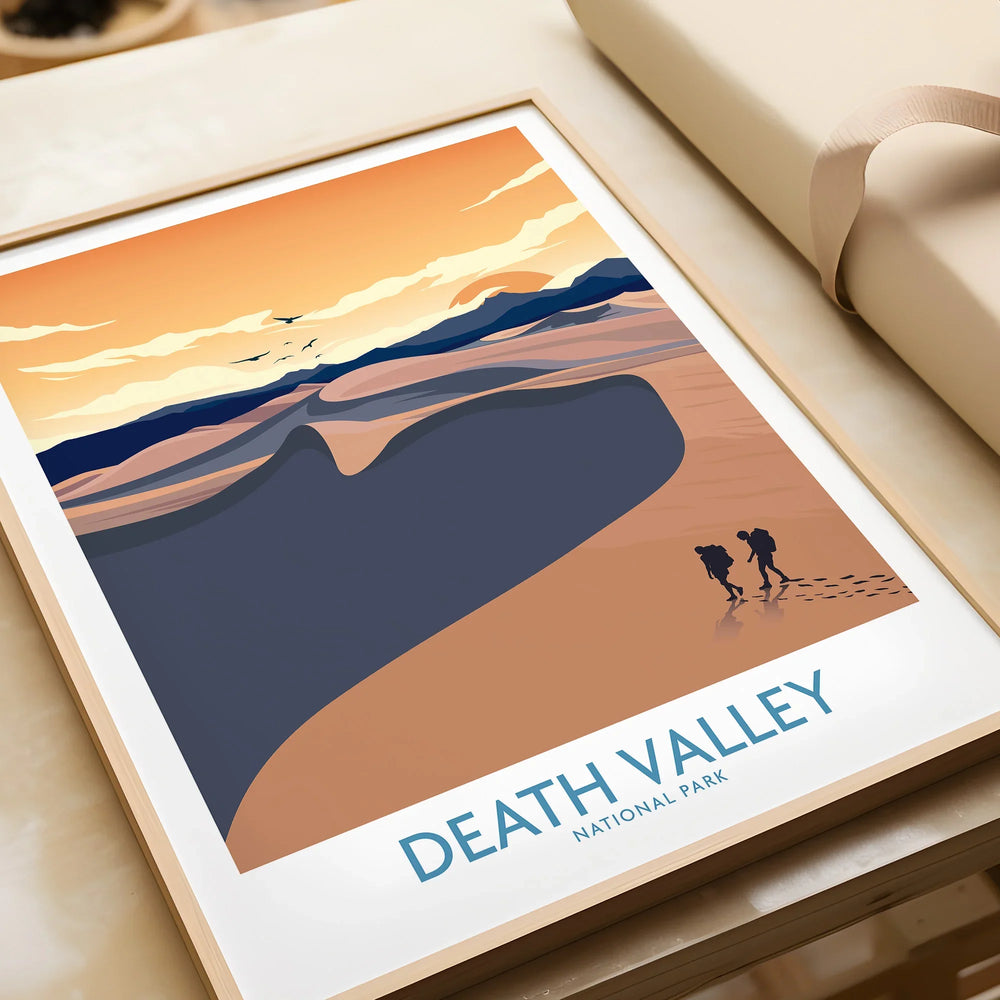 Framed art print of Death Valley National Park desert scene with sunset and hikers