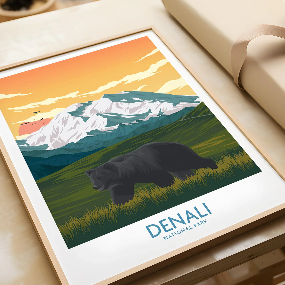 Framed Denali National Park art print with a bear, mountains, and sunset, unwrapped as a gift