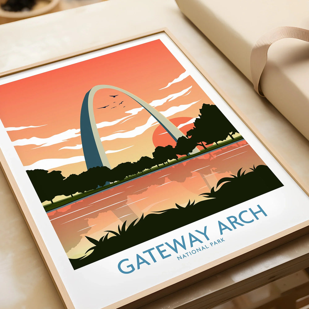 Framed Gateway Arch National Park art print with sunset and reflection, unwrapped as a gift.