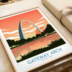 Framed Gateway Arch National Park art print with sunset and reflection, unwrapped as a gift.