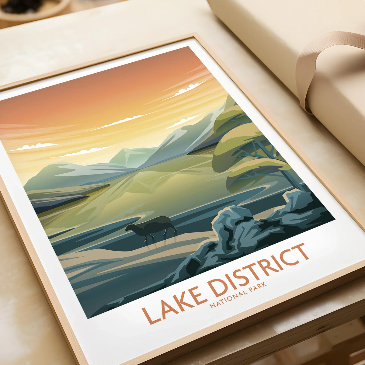 Lake District National Park art print with sunset, mountains, trees, and grazing sheep in frame
