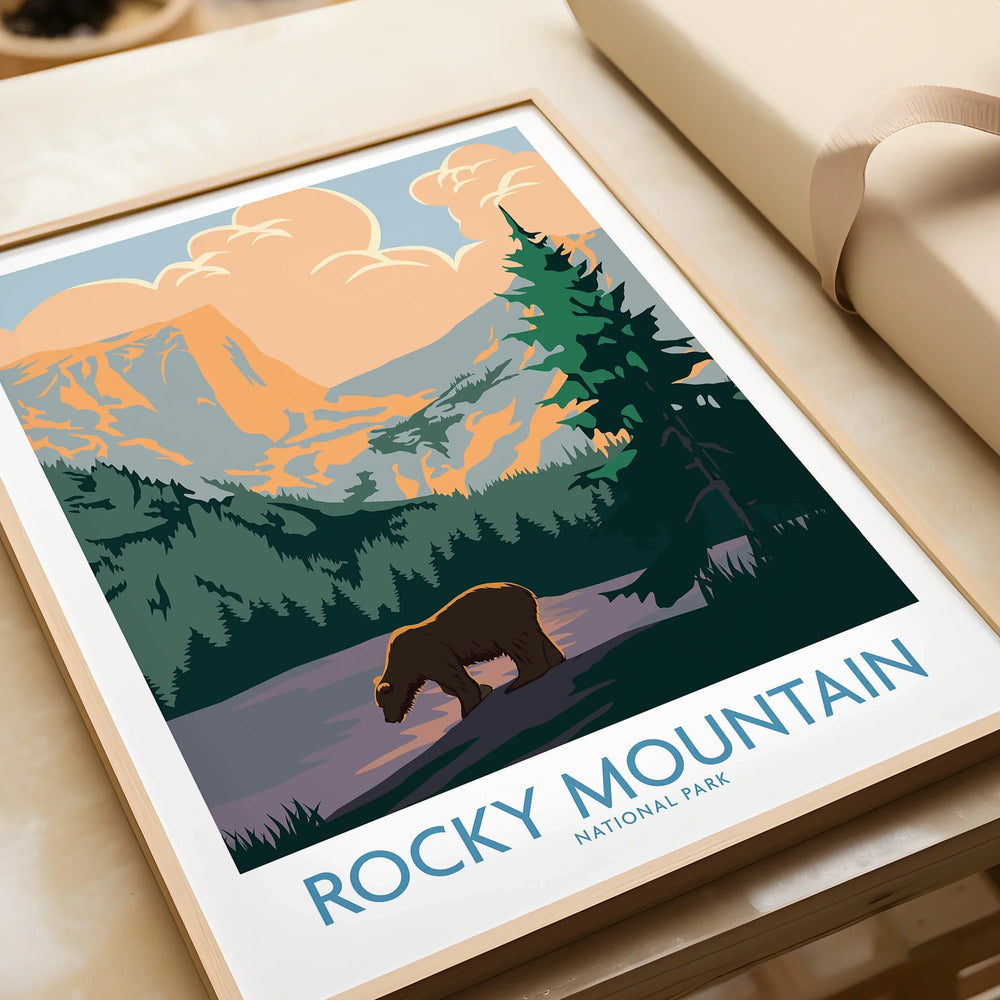 Framed Rocky Mountain National Park art print featuring a bear, scenic forest, and mountains.