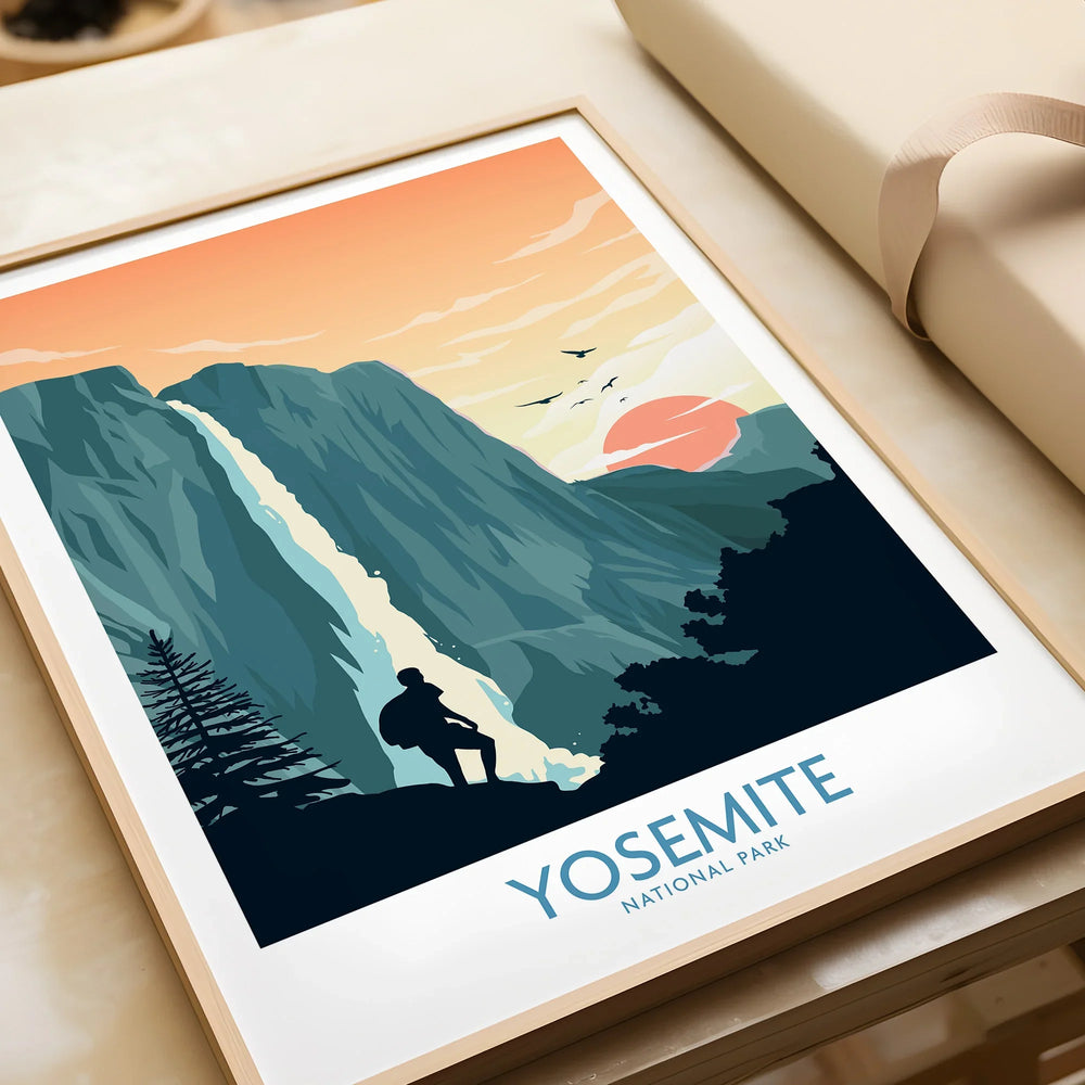 Framed Yosemite National Park art print with waterfall, hiker, and sunset illustration